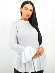 Contrasto Detalle de la camisa del dobladillo Top