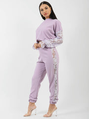 Bloemen kanten mouw en paneel detailcoördin