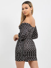 Polka dot slinky ruches jurk