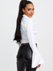 Top de estilo corsé con mangas de campana