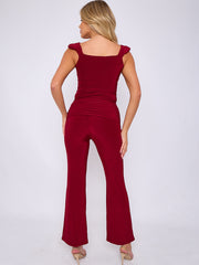 Ruches riemen slinky top- en breedbeen broekcoördin