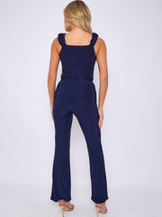 Ruches riemen slinky top- en breedbeen broekcoördin