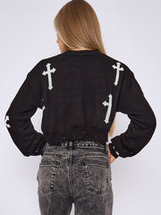 Kruzifix -Detail gestrickter Kumpelspringer