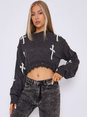 Kruzifix -Detail gestrickter Kumpelspringer