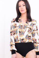 Blumenkettendruckpapier -Wickel -Bodysuit