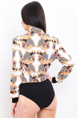 Blumenkettendruckpapier -Wickel -Bodysuit