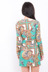 Sjaalprint twist knoop wrap jurk