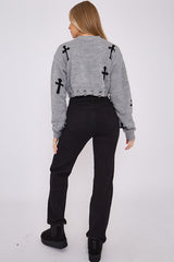 Kruzifix -Detail gestrickter Kumpelspringer