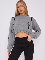 Kruzifix -Detail gestrickter Kumpelspringer