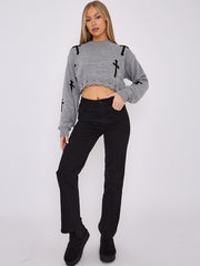 Kruzifix -Detail gestrickter Kumpelspringer