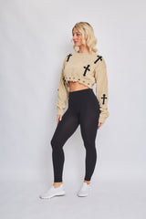 Kruzifix -Detail gestrickter Kumpelspringer