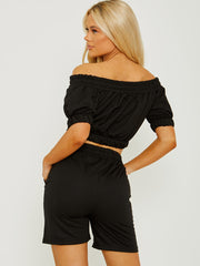 Elastische Bardot Crop Top & Shorts coöperatie