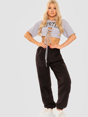 Hustle Graphic Eyelet Crop Top