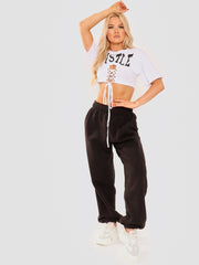 Hustle Graphic Eyelet Crop Top