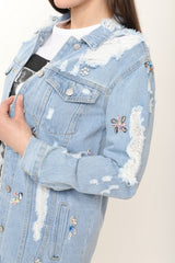 Chaqueta de mezclilla desgastada adornada