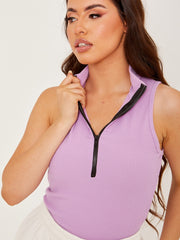 Reißverschlussdetail gerippter Bodysuit