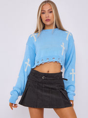 Kruzifix -Detail gestrickter Kumpelspringer