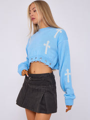 Kruzifix -Detail gestrickter Kumpelspringer