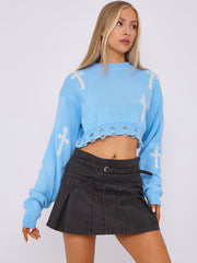 Kruzifix -Detail gestrickter Kumpelspringer