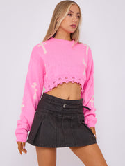 Kruzifix -Detail gestrickter Kumpelspringer