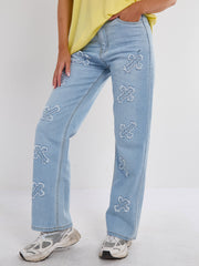 Crucifix geborduurde rechte been denim jeans