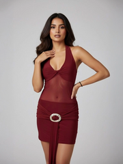 Mini-jurk met pailletten en strik op de rug