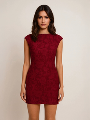 Mini-jurk met pailletten en strik op de rug