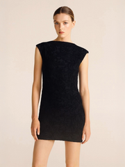 Mini-jurk met pailletten en strik op de rug