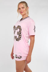 La varsity t-shirt met shorts coöperatie (kopie)