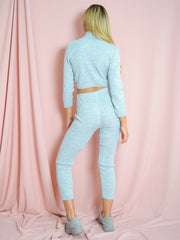 Coordina acanalada de punto de cuello enrollable