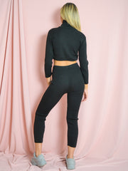 Coordina acanalada de punto de cuello enrollable