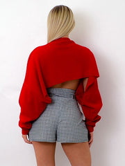 Kruppierter Fledermaus -Strickpullover