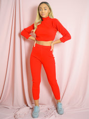 Coordina acanalada de punto de cuello enrollable