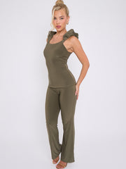 Ruches riemen slinky top- en breedbeen broekcoördin