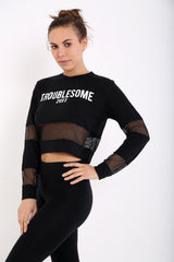 Oversized 'TROUBLESOME' Fishnet Stripe Crop Top
