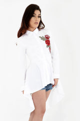 Rose Embroidered Dip Hem Shirt