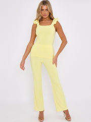 Ruches riemen slinky top- en breedbeen broekcoördin