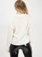 Schalten Sie die Hülle mit V-Ausschnitt-Strickpullover auf