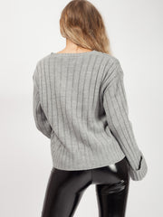 Schalten Sie die Hülle mit V-Ausschnitt-Strickpullover auf