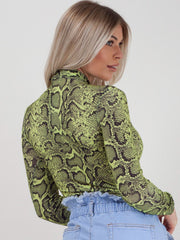 Traje de manga larga con estampado de serpiente de cuello alto