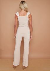 Ruches riemen slinky top- en breedbeen broekcoördin