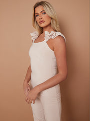 Ruches riemen slinky top- en breedbeen broekcoördin