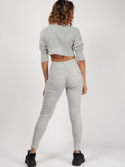 Coordina acanalada de punto de cuello enrollable