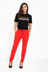 Pantalones con paneles de rayas con cordero