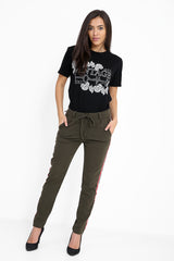 Pantalones con paneles de rayas con cordero