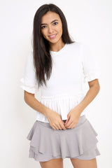 Ruches franje zoom en mouwen top