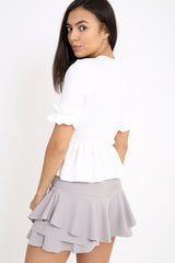 Ruches franje zoom en mouwen top