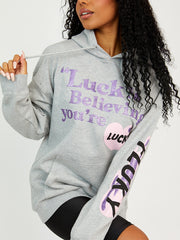 Das Glück ist der Glaube an Grafikabdruck Hoodie