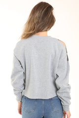 Laserschnitte die Seiten kaltes Schulter -Fleece -Oberteil