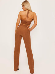 Top de cultivo de halter cruzado y pantalón coorden